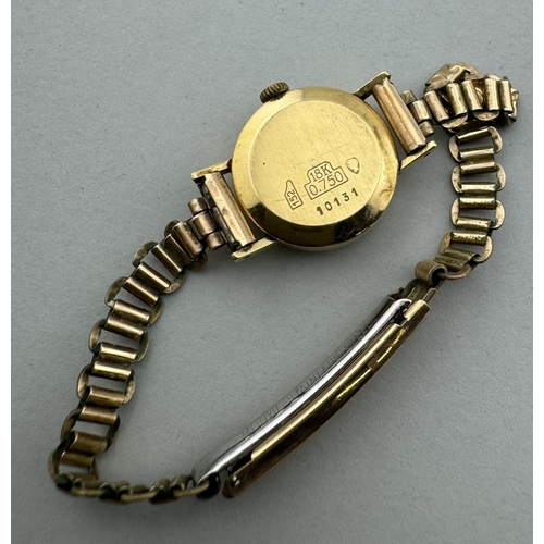 939 - Watches: Watches: A ladies 9ct gold Excalibur watch on expanding plated strap; an 18ct gold ladies w... 