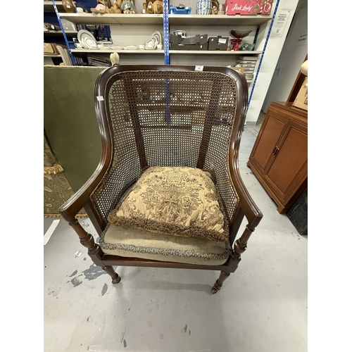 94 - Furniture: Furniture: 19th century French mahogany armchair on sabre back supports and turned front ... 