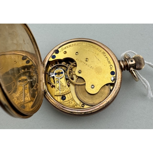 944 - Watches: Watches: An American Waltham Watch Company ladies full hunter pocket watch, in yellow metal... 