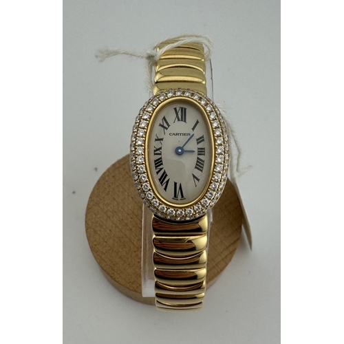 947 - Watches: Watches: A Cartier Baignoire ladies wristwatch in 18ct gold, the oval dial set a double hal... 