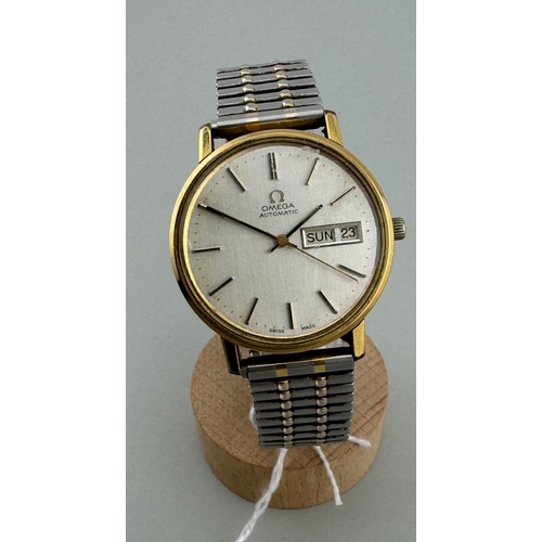 951 - Watches: Watches: A gents 1970s Omega Automatic day date watch, in round gold plated case on expandi... 