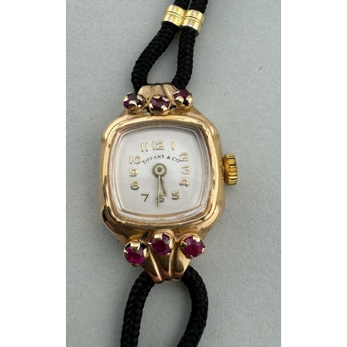 954 - Watches: Watches: A ladies 18ct gold cocktail watch, the dial marked Tiffany & Co, containing a ... 