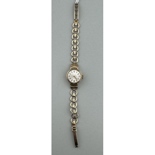 965 - Watches: Watches: A 9ct gold ladies Avia cocktail watch, on gold open link bracelet. Head 1.7cm diam... 