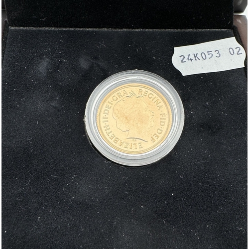 985 - Coins: Coins: A 2014 Queen Elizabeth II brilliant uncirculated full sovereign, encapsulated, boxed.... 