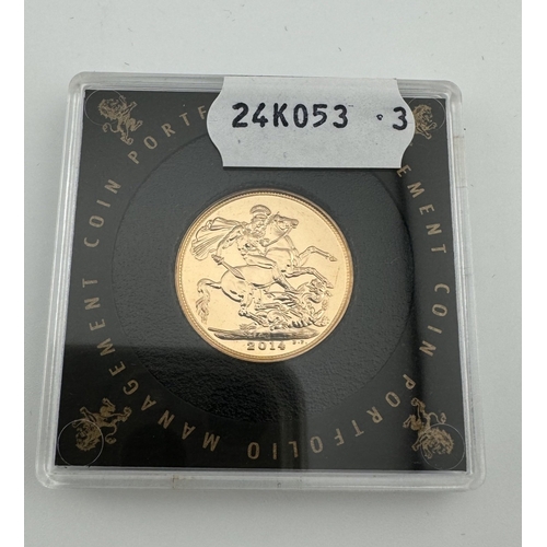 988 - Coins: Coins: An encapsulated 2014 Queen Elizabeth II uncirculated full sovereign.