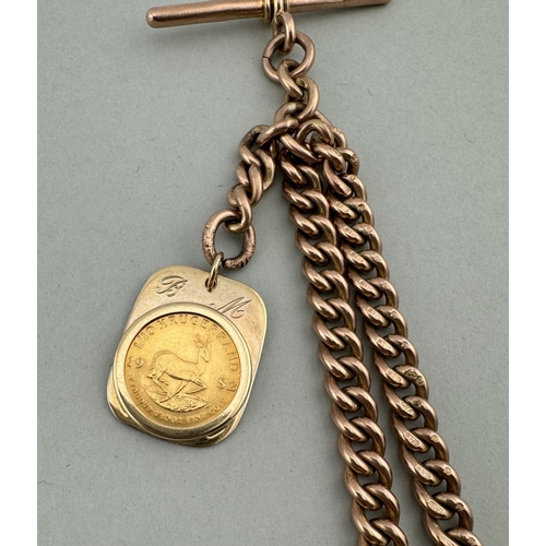 990 - Jewellery: Jewellery: A 9ct rose gold pocket watch chain with mounted 1/10 Krugerrand fob, maximum l... 