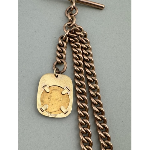 990 - Jewellery: Jewellery: A 9ct rose gold pocket watch chain with mounted 1/10 Krugerrand fob, maximum l... 