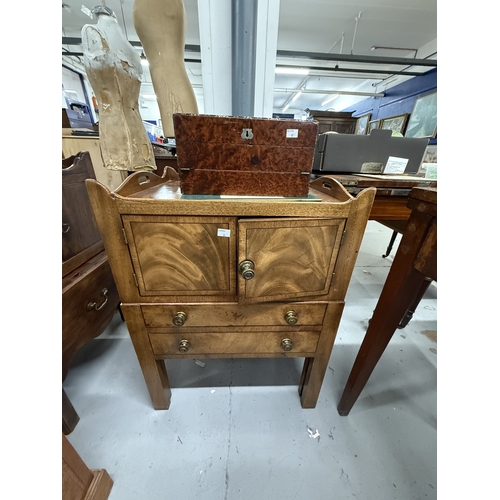 128 - Furniture: 19th century mahogany commode with tray shelf top, twin door cupboard with quarter cut pa... 