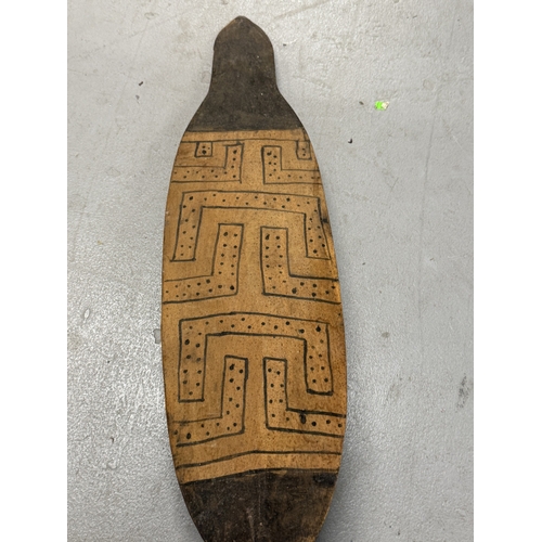 140 - Ethnographica/Tribal Arts: A Guyana paddle (South America) with painted geometric decoration to each... 