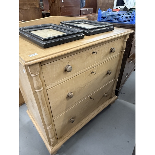 149 - Furniture: Late 19th century pine three-drawer chest of draws with split balustrade decoration. Upho... 