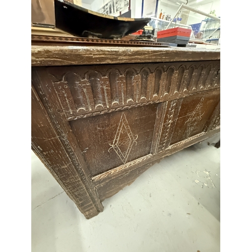 152 - Furniture: Late 17th-century oak coffer with three-panel top with original split pin hinges, the fro... 