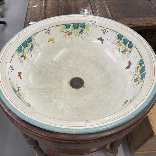 153 - Furniture: 19th century mahogany wash stand with wash bowl, 55cm diameter, with copper drainage and ... 