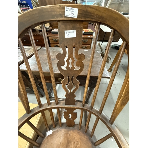 155 - Furniture: 19th century Windsor rocking chair oak and elm construction of large proportions.