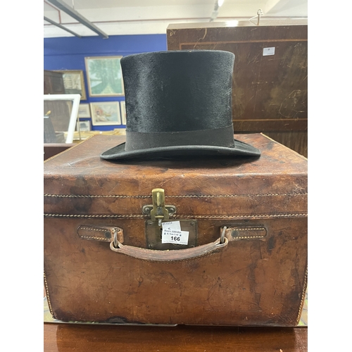 166 - Fashion: 19th century leather hat box with padded interior and a Milton & Co velvet tophat, 19.5... 