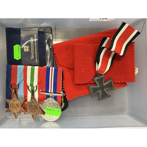 192 - Medals: Military WWII 1939-1945 Star, Italy Star and a War Medal mounted, an Iron Cross plus commemo... 