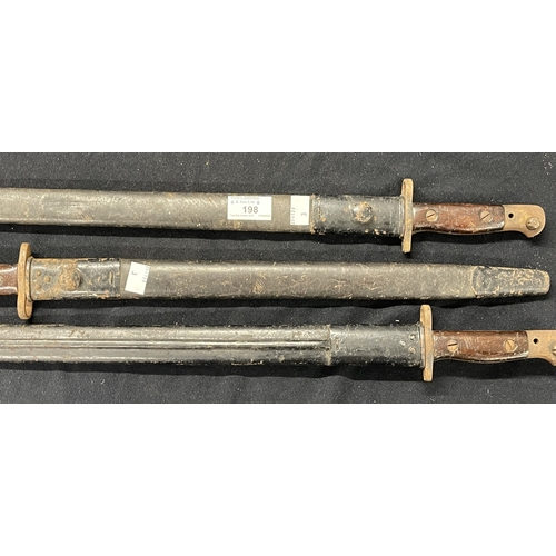 198 - Militaria: British Army 1907 pattern bayonets x 3 one with polished blade, all with scabbards.... 