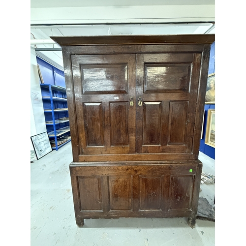 203 - Furniture: 18th-century oak dresser/hanging robe, two three fielded panel doors over a four-panelled... 