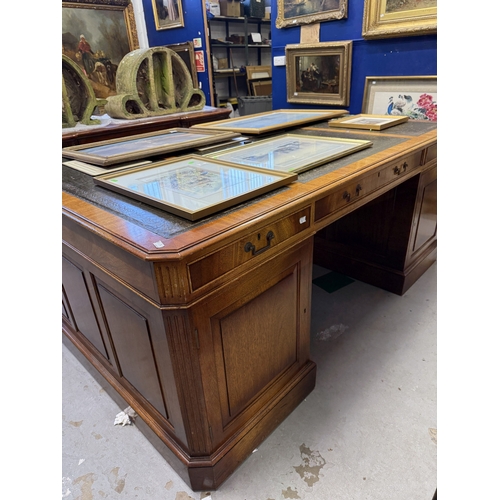 207 - Furniture: 20th-century large mahogany partners desk, with triple green leather skiver on the top su... 