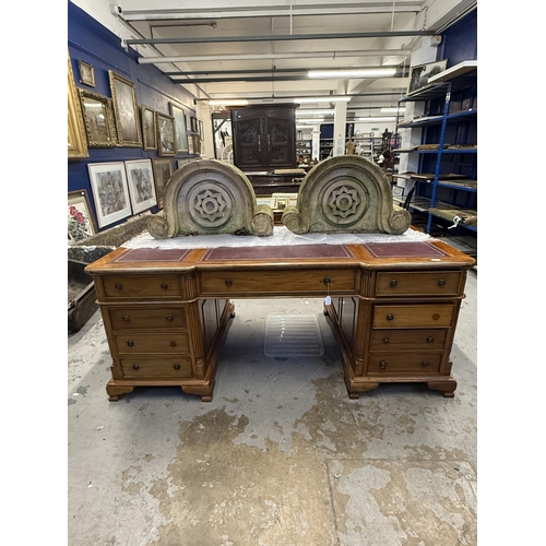 208 - Desk: 20th-century mahogany double pedestal full-faced partner desk. Single drawer over doors with l... 