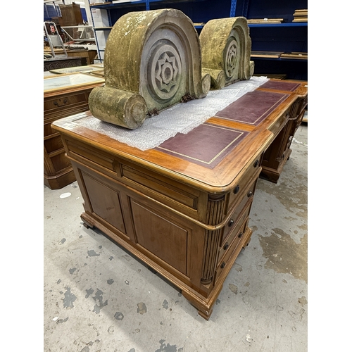 208 - Desk: 20th-century mahogany double pedestal full-faced partner desk. Single drawer over doors with l... 