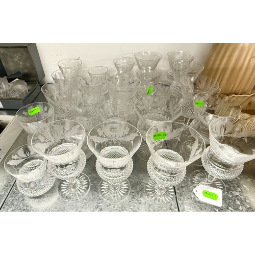 349 - Glassware: A part suite of Edinburgh Crystal glasses of thistle form, hobnail cut body with acid etc... 