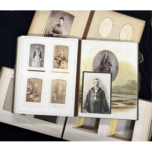 366 - Photographs: Antique photographs, two leatherbound photo albums with clasps, containing many 19th-ce... 