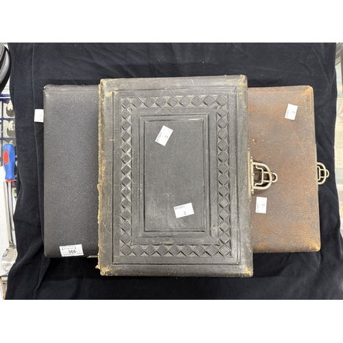 366 - Photographs: Antique photographs, two leatherbound photo albums with clasps, containing many 19th-ce... 