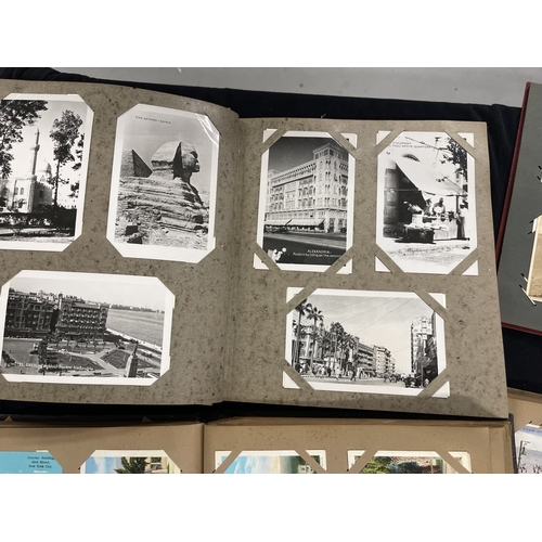 368 - Postcards: Postcards, four albums of Edwardian and later cards. The two larger contain Canadian, Jap... 