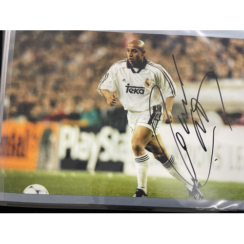 408 - Sporting Autographs: A large collection of signed Football photographs bearing the signatures of mos... 