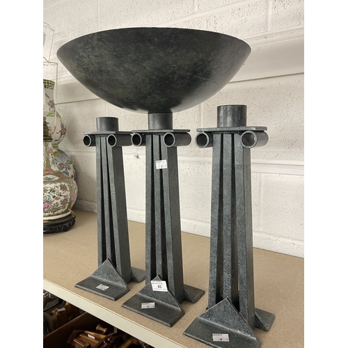 43 - Metalware: Al Frank designs cast metal altar garniture in the Brutalist style consisting of a centra... 