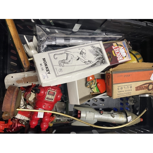 514 - Toys and games: Tin plate and metalware hot air balloons and rockets etc.