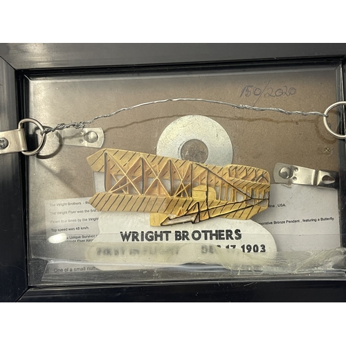 529 - Early Aviation: 'Wright Flyer' 1903 commemorative souvenir, a model of the plane in a double-sided g... 