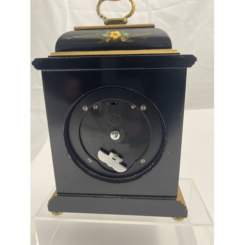 545 - Clocks: 20th century Elliott of London black chinoiserie lacquered mantel clock with silvered chapte... 