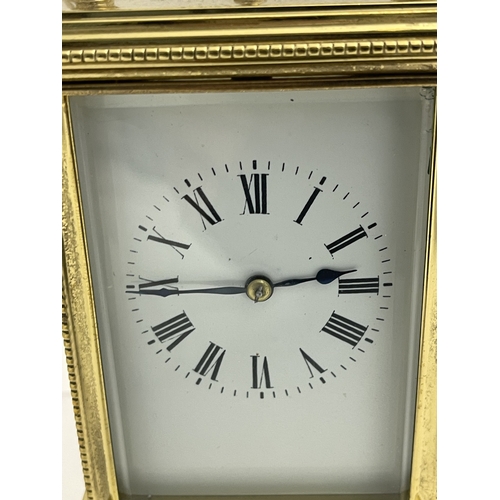 547 - Clocks: A 19th century four glass repeater carriage clock and key, with enamel dial and Roman numera... 