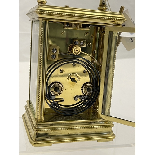 547 - Clocks: A 19th century four glass repeater carriage clock and key, with enamel dial and Roman numera... 