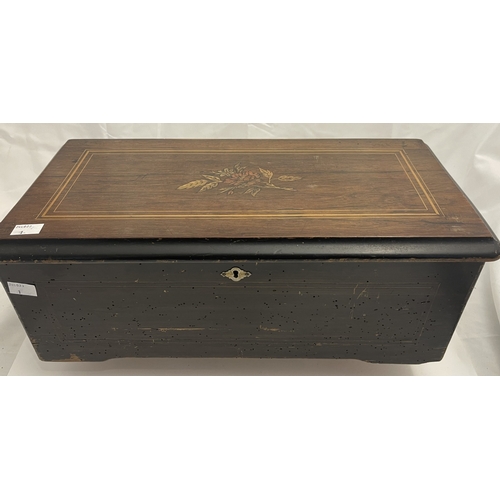 558a - Music: A simulated rosewood 10-air Swiss music box. No visible marks. The comb and cylinder are inta... 