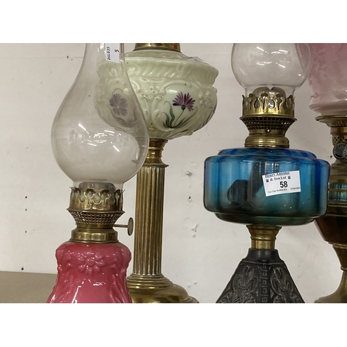 58 - Lighting: 19th/20th century Corinthian brass column oil lamp with hand-painted milk glass reservoir.... 