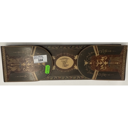 598 - Treen: An early 20th century Sorrento olivewood bookslide, inlaid with scrolls and mythical beasts w... 