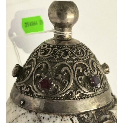 603 - Oriental: A Tibetan style dung dkar or ritual trumpet, a conch shell mounted in silver and inset wit... 