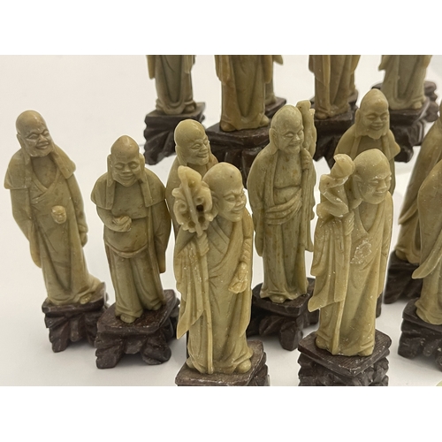 604 - Oriental: A set of carved soapstone figures depicting the eighteen Buddhist Arhats, each around 12cm... 