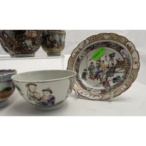 607 - Oriental: Four Chinese figural painted famille rose tea bowls, a single saucer, and five similarly d... 