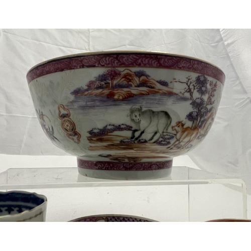 609 - Oriental: An 18th century Chinese export bowl painted with animals and flowers, 17cm, together with ... 