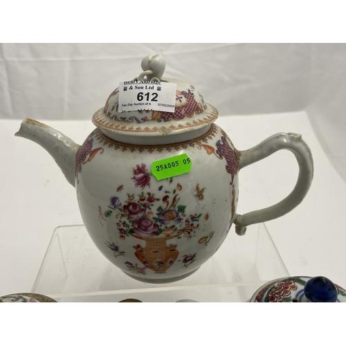 612 - Oriental: A Chinese export famille rose bullet teapot, 18cm long, another enamelled with birds among... 