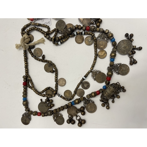 621 - Tribal Bedouin - Saudi: Mid-20th century white metal jewellery, necklace with 14 facet cubes and nin... 