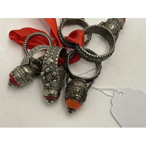 622 - Tribal Bedouin - Saudi: Finger rings with coral and faux coral mounts 93g.