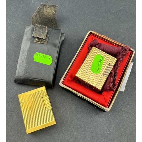 665 - Tobacciana: A gold plated briquette lighter by Dupont complete with original pouch, box and guarante... 