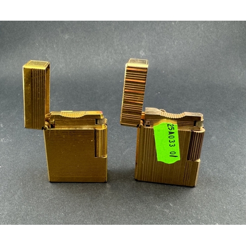 665 - Tobacciana: A gold plated briquette lighter by Dupont complete with original pouch, box and guarante... 