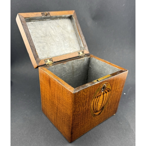 710 - Treen: A late 18th century harewood cube tea caddy, inlaid with satinwood flowers to lid and front, ... 