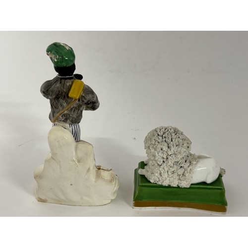 729 - Ceramics: A Staffordshire porcelain figure of a poodle, c.1820, recumbent on a green base, and a Sta... 