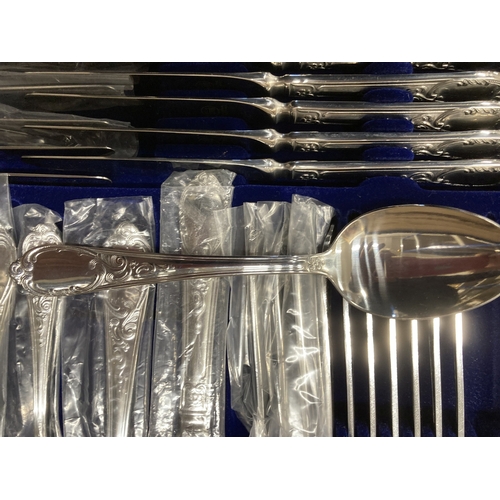 73 - Silver Plate: A Solingen 72 piece cutlery set, in original briefcase with key, more or less unused.... 